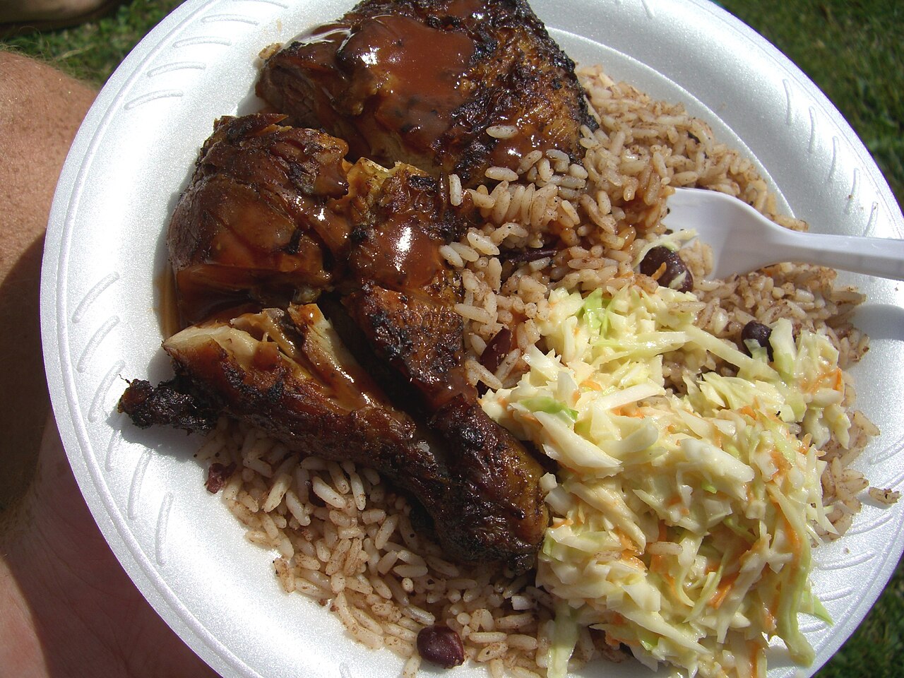 Jerk chicken with rice and peas